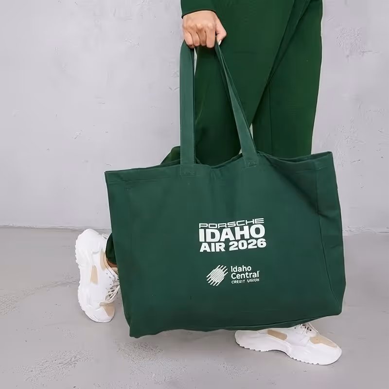 2026 promotional concept of a green branded tote bag