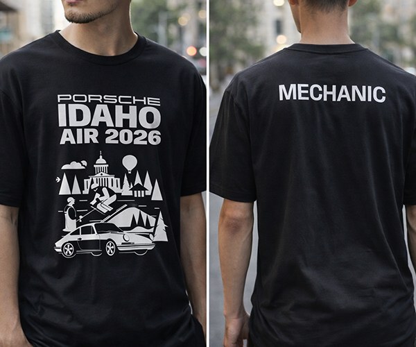 Front and back of the black 2026 Idaho Air crew tee, with the Porsche Idaho Air 2026 artwork on the front